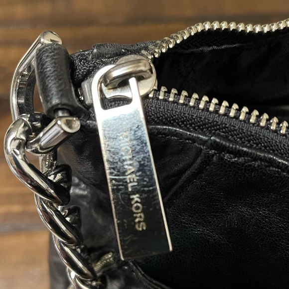 Michael Kors Black and Silver Chain and zippers Bag. - Picture 4 of 7